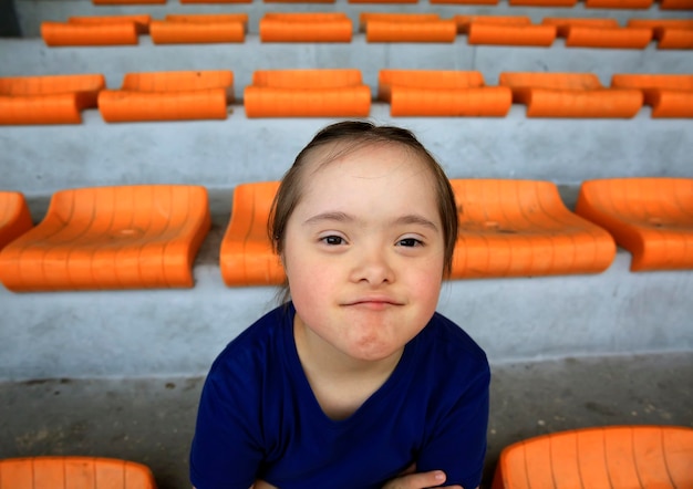 Little girl have fun on the stadium