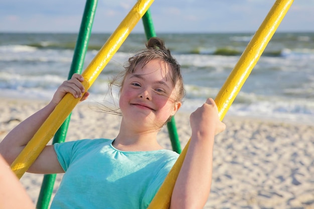 Little girl having fun on the swing