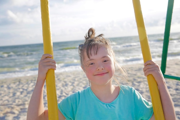 Little girl having fun on the swing