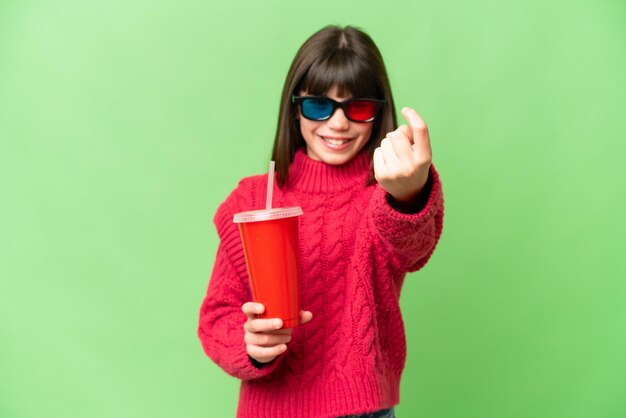 Little girl holding soda over isolated chroma key background doing coming gesture