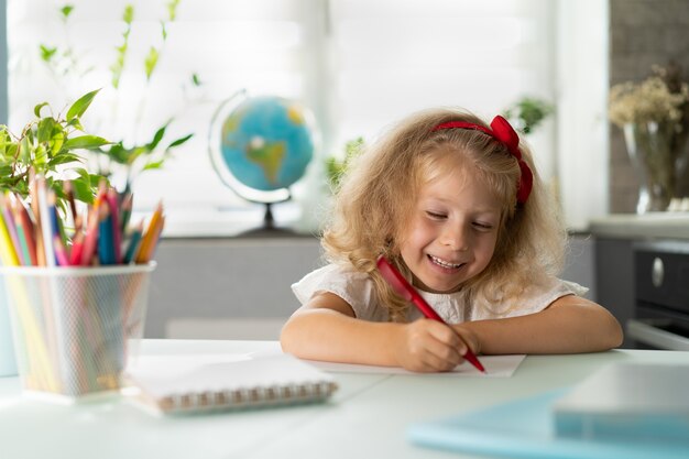 Little girl homeschooling back to school