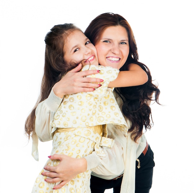 Little girl hugging her mother