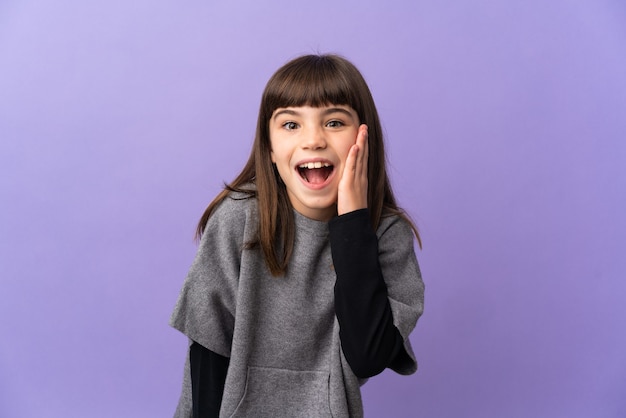 Little girl over isolated background with surprise and shocked facial expression