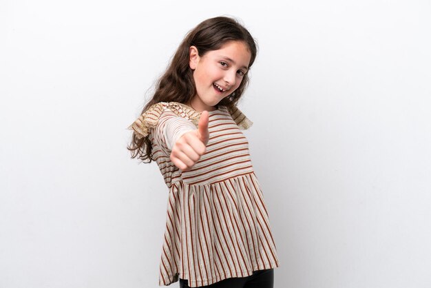 Little girl isolated on white background with thumbs up because something good has happened