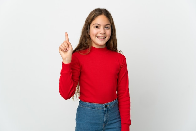 Little girl over isolated white showing and lifting a finger in sign of the best