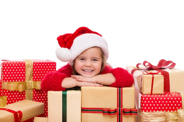 Little girl laying on Christmas box