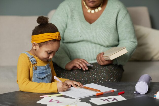 Little girl learning alphabet