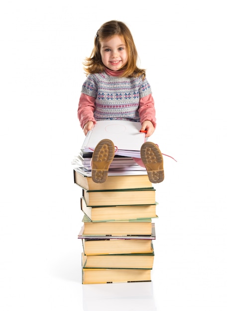 Little girl learning on books. back to school