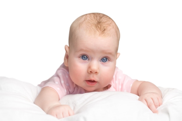 The little girl lies on a pillow - cloud. isolated on a white background