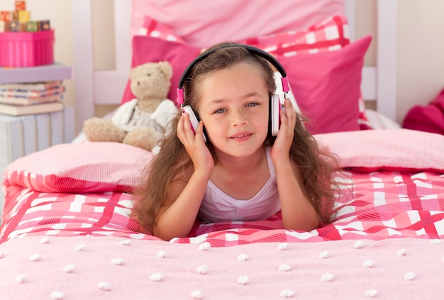 Little girl listening music