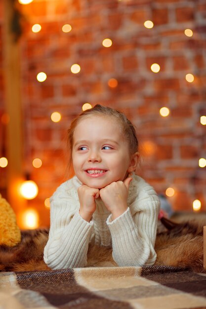 Little girl lying on the floor