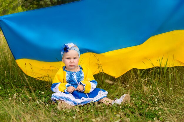 little girl in national Ukrainian clothes - vyshyvanka. Ukraine, war, aggression, terrorism.