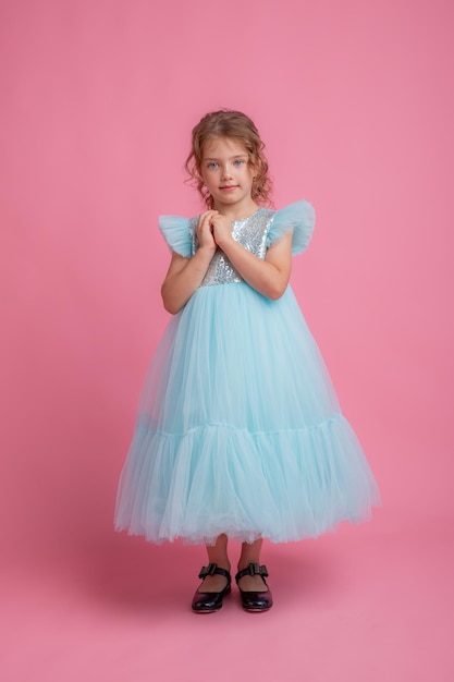 little girl pink background, beautiful princess dress