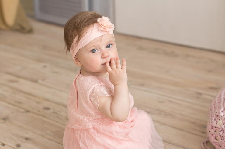 little girl in pink dress
