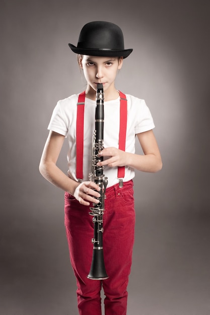 Little girl playing clarinet