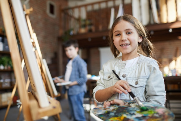 Little Girl Posing in Art Class