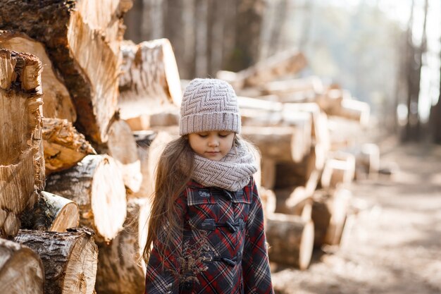 Little girl posing in the forest