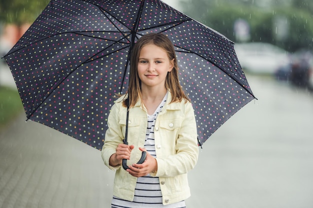 Little girl in rainy day