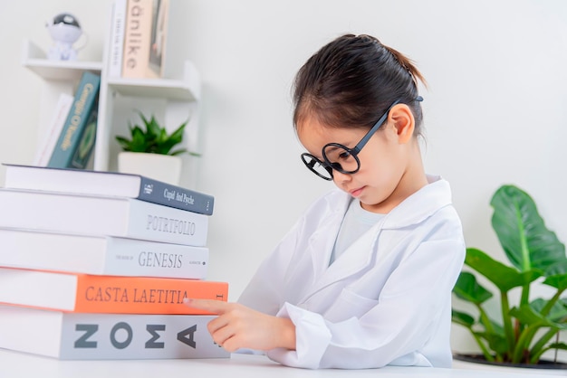 Little girl reading for research