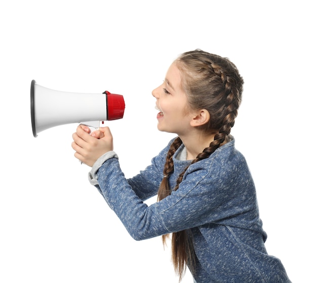 Little girl shouting into megaphone on white 