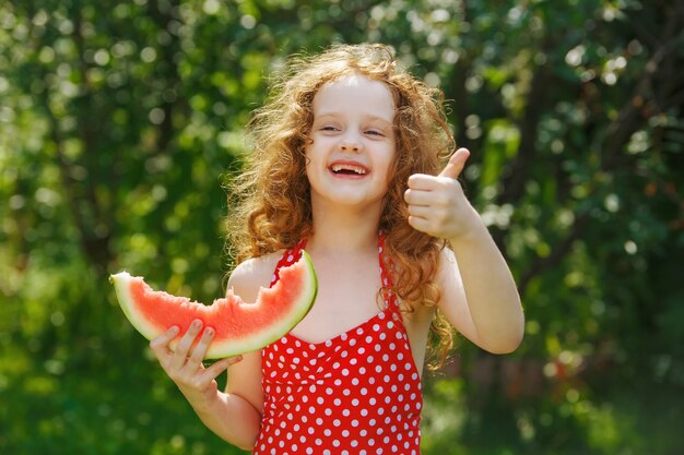 Little girl shows thunps up.