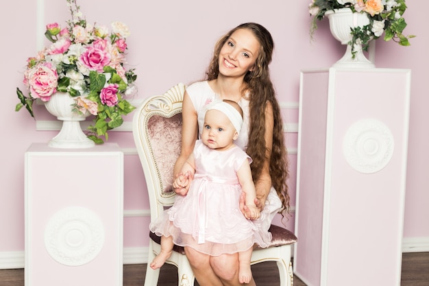 Little girl sitting on the chair