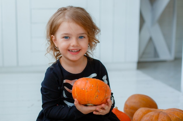 Little girl in a skeleton costume