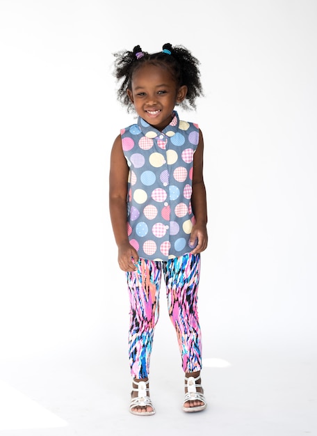 Premium Photo | Little girl smiling happiness studio portrait