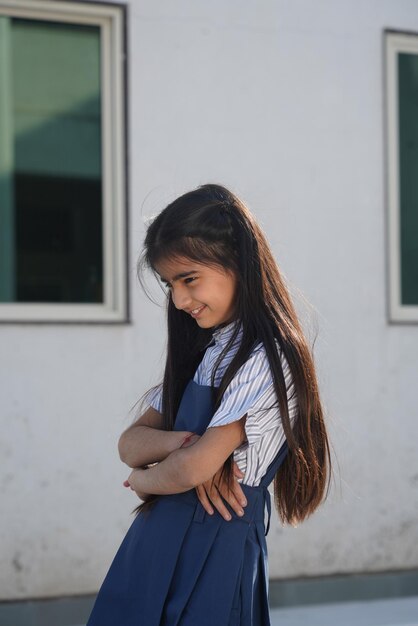 Little girl smiling and looking at camera. selctive focus, shallow depth of field, blur