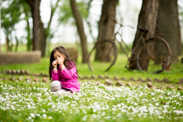 Little girl at the spring field