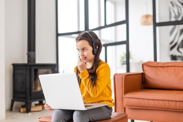 Little Girl Using Digital Laptop E-learning Concept.