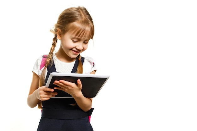 little girl using tablet computer. Isolated on white background.