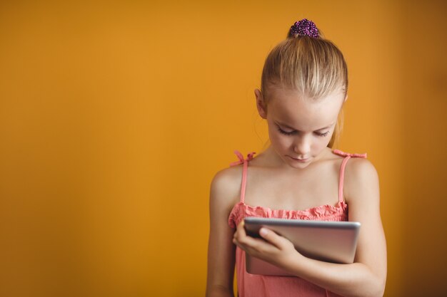 Little girl using a tablet