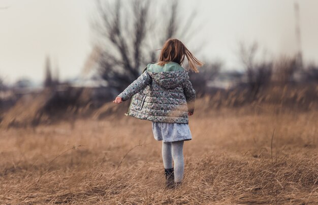 Little girl walking away