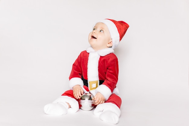 Little girl wearing santa claus costume