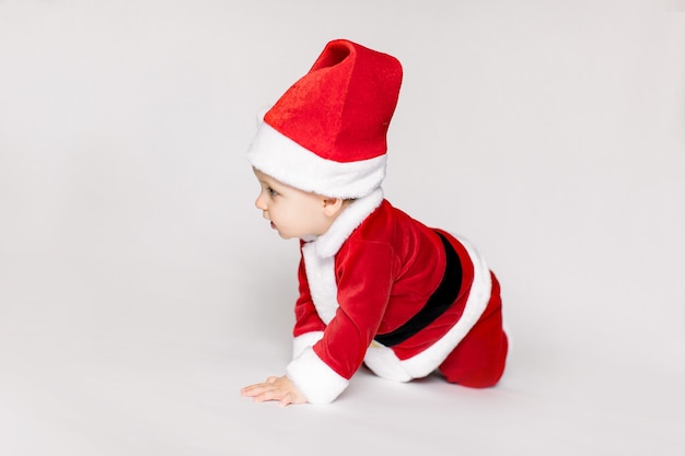 Little girl wearing santa claus costume