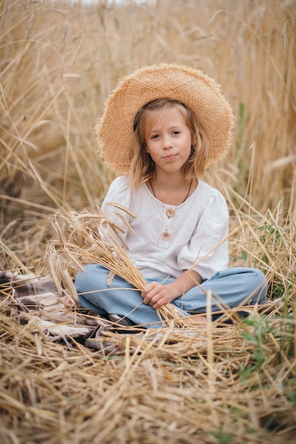 little girl in a wheat field