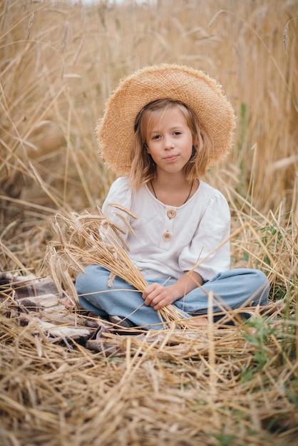 Little girl in a wheat field