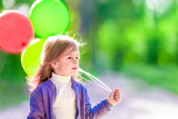 Little girl with balloons Closeup