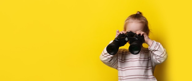 Little girl with binocular panoramic