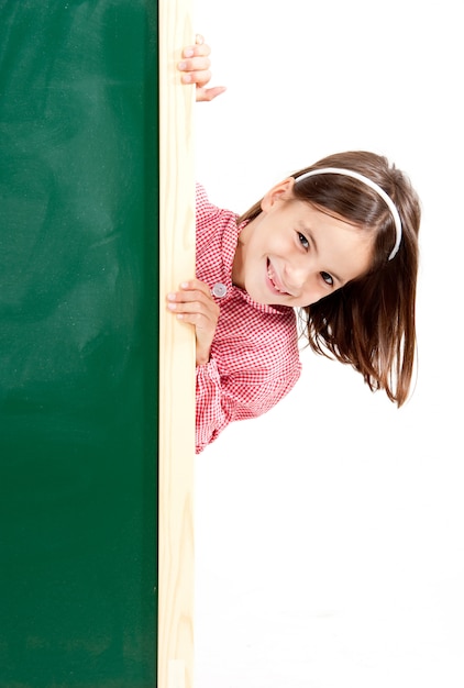 little girl with blackboard isolated on white 