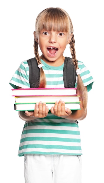 Little girl with books isolated on white background