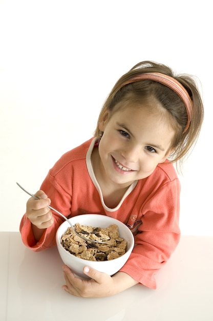 Little girl with breakfast