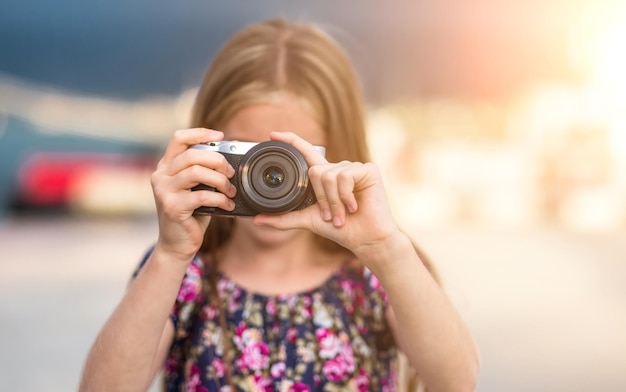 Little girl with camera