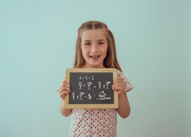 little girl with chalkboard