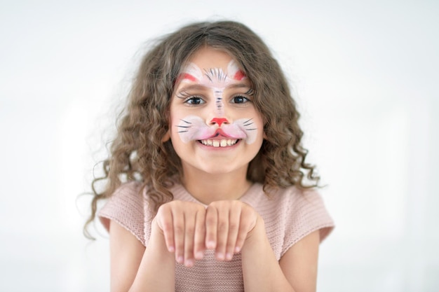 Little girl with face painted