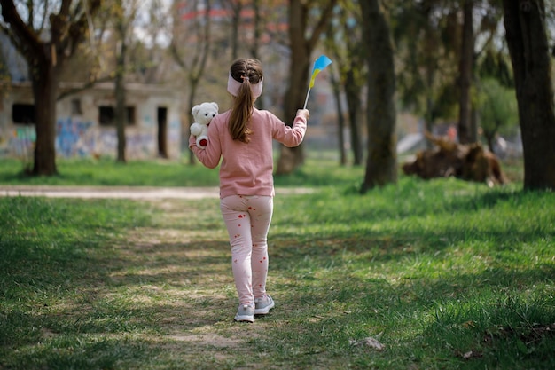 Little girl with the flag of ukraine independence day of ukraine