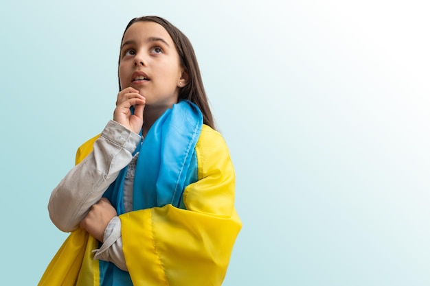 little girl with the flag of Ukraine.