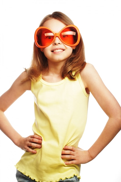 little girl with fun orange carnaval glasses