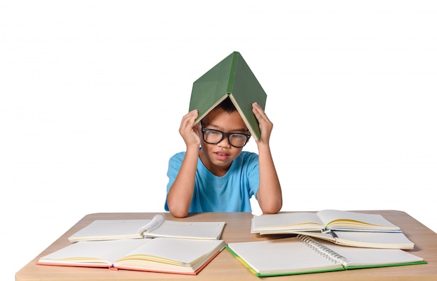 Little girl with glasses thought and many book on table. back to school concept, isolated on white